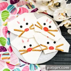 Easter Bunny Bark with pretzels, jelly beans, candy eyes, and candy ears, an easy no-bake treat for Easter.