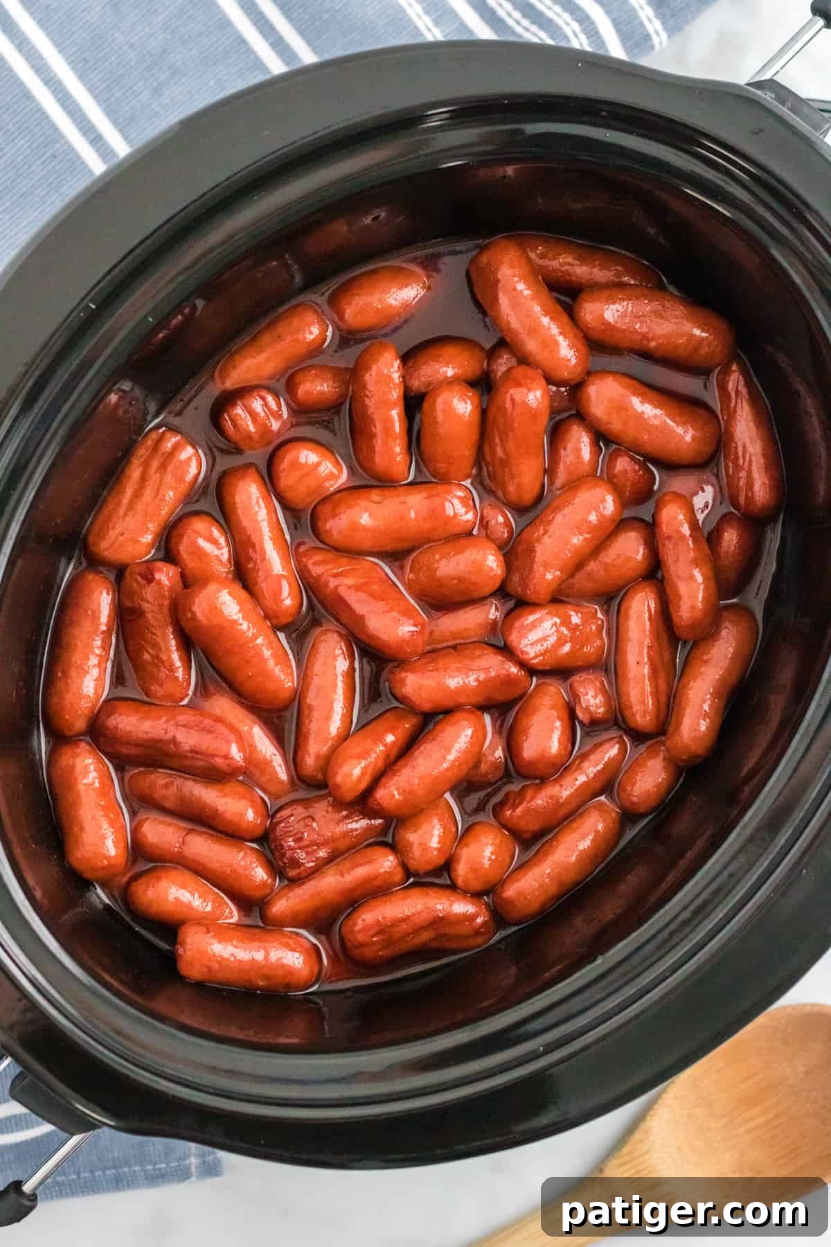 Sweet Glazed Slow Cooker Smokies 6 Crockpot lil smokies with sweet and savory bbq sauce.