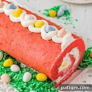 Easter cake roll with whipped cream filling and mini eggs.