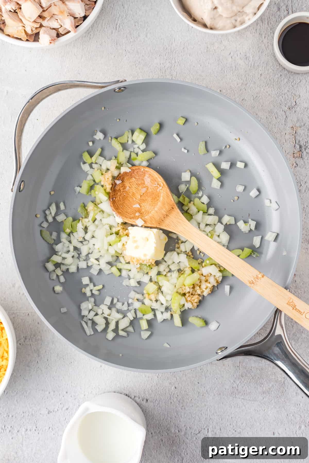 Vegetables with butter in skillet.