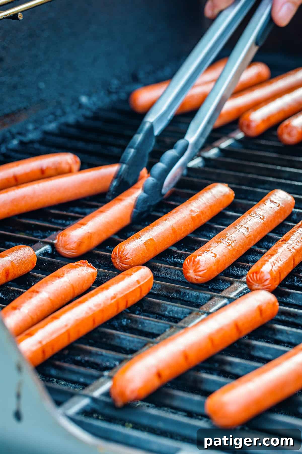 Hot dogs on the grill.