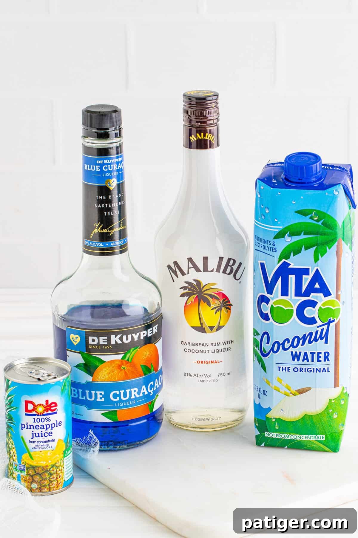 Pineapple juice, Blue Curaco, Malibu, and coconut water.