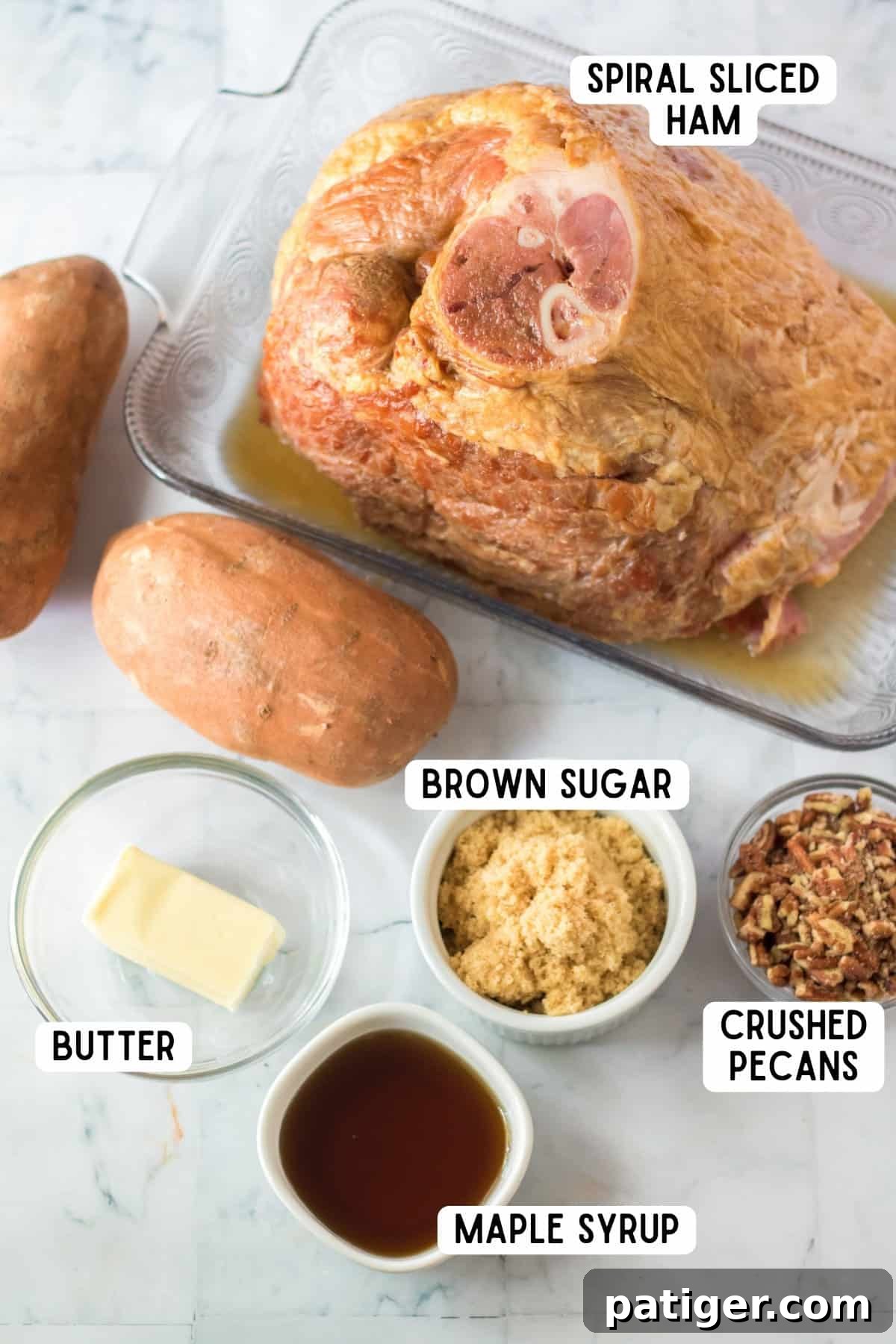 A collection of ingredients for pecan praline glazed ham: ham, butter, maple syrup, brown sugar, and crushed pecans.
