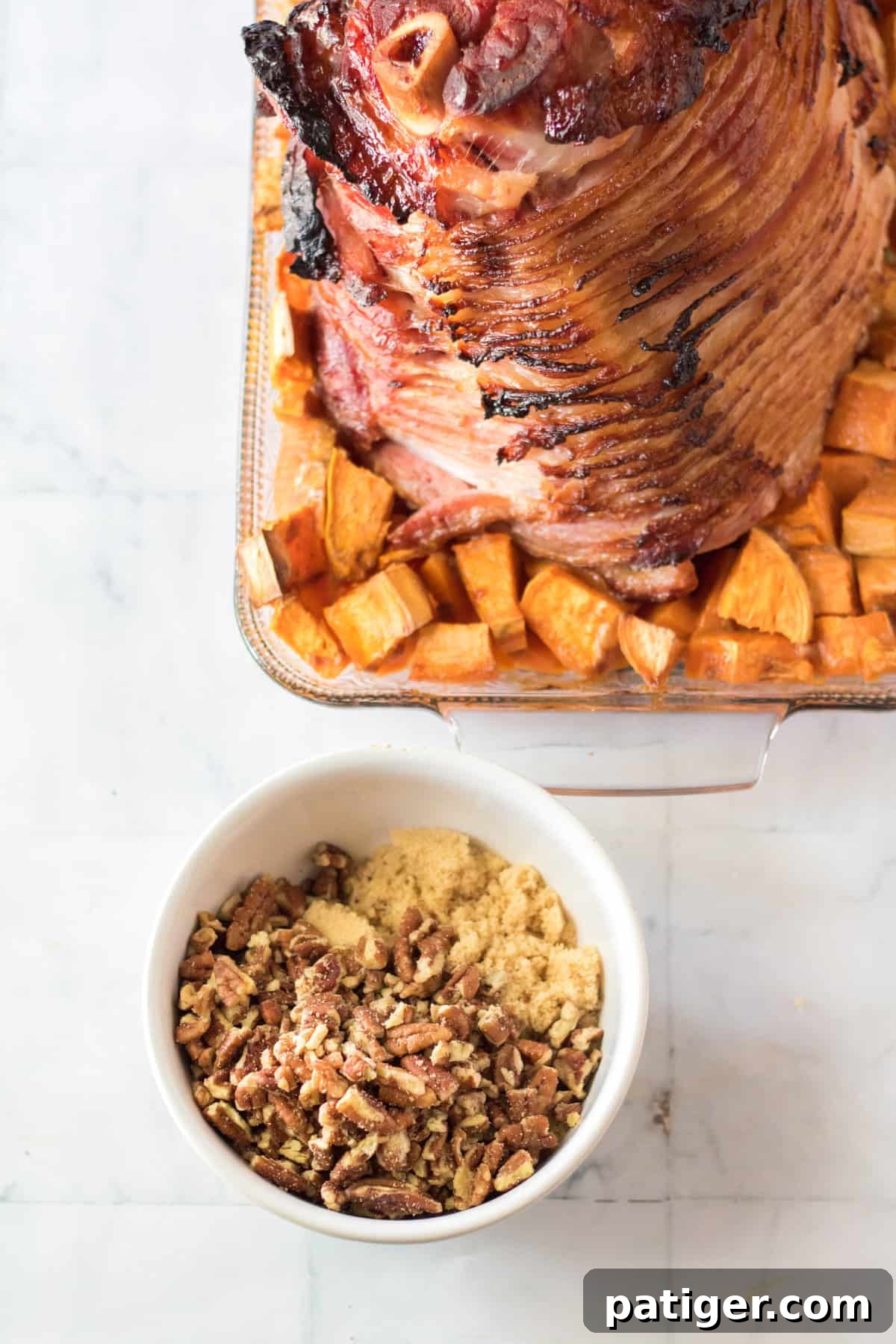 Brown sugar and crushed pecans mixed together in a small bowl, ready for the ham topping.