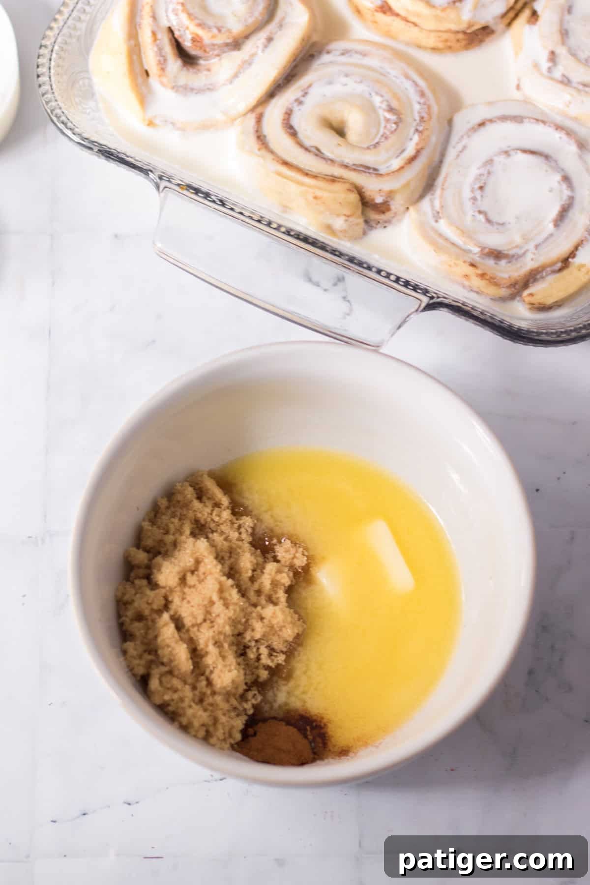 Small bowl with melted butter and brown sugar.