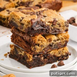 Brookie bars stacked on a plate, ready to be served.