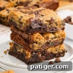 Brookie bars stacked on a plate, ready to be served.