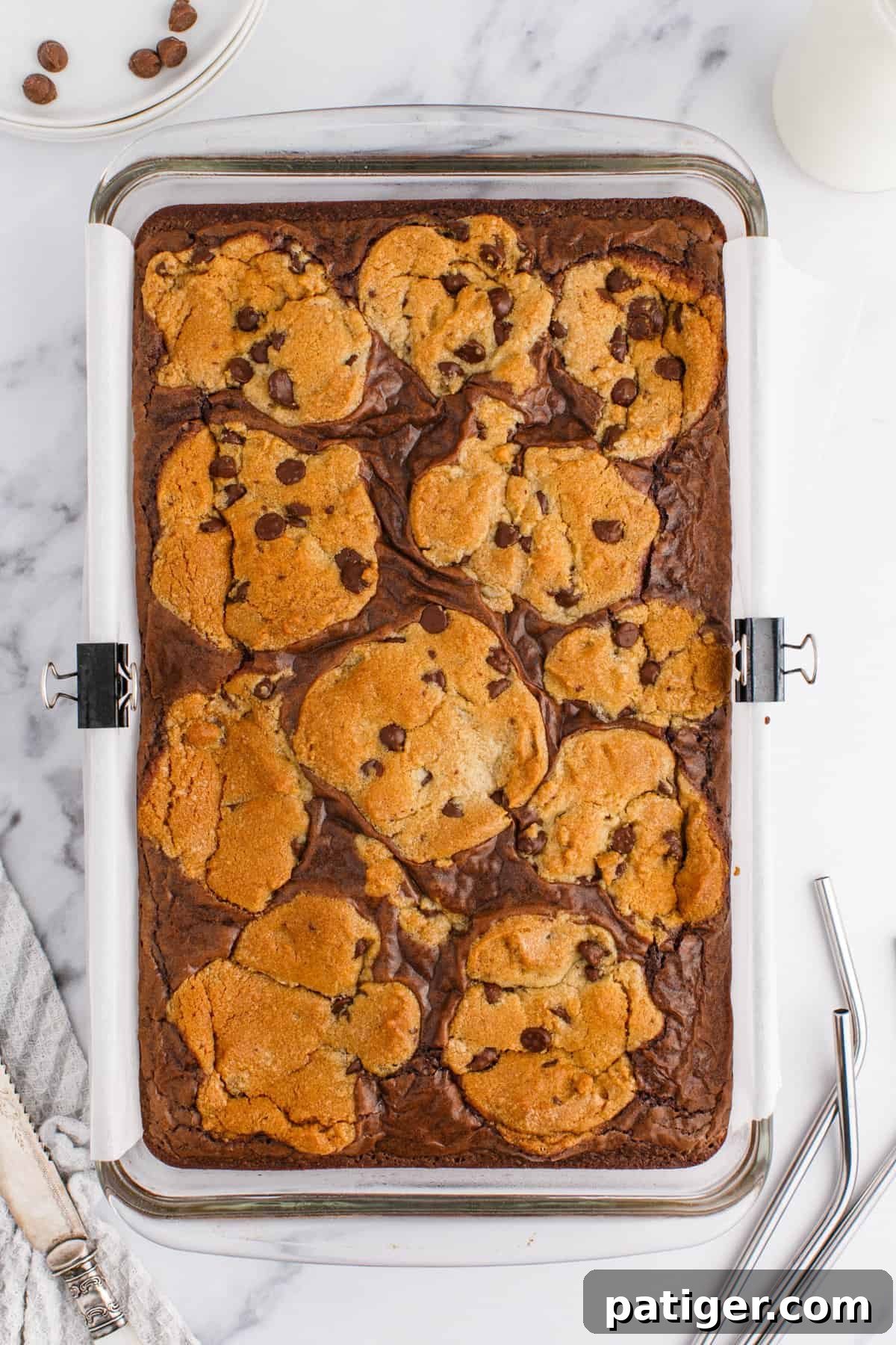 Freshly baked brookie bars, golden brown and glistening, cooling in the pan.