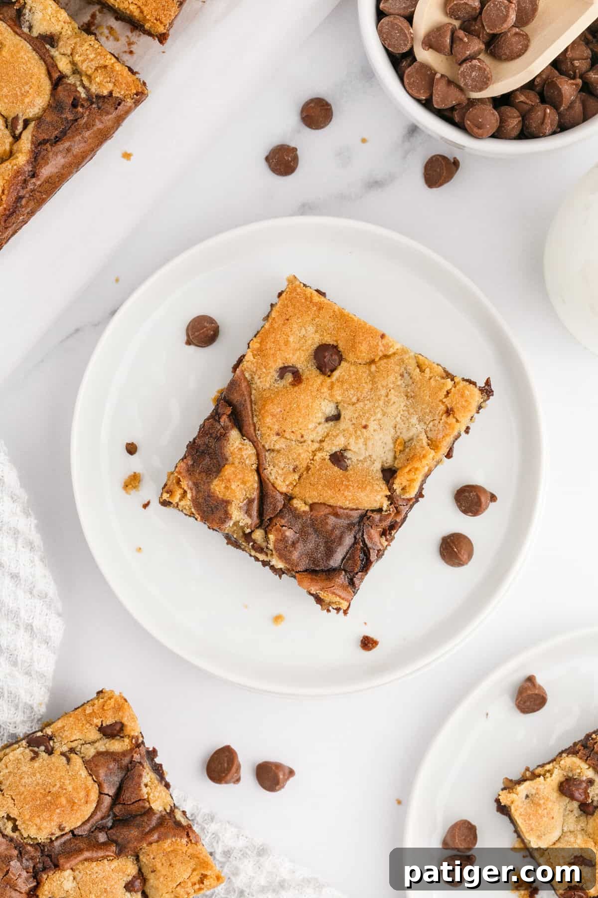 A single brookie bar, showcasing the distinct layers of brownie and chocolate chip cookie in perfect harmony.