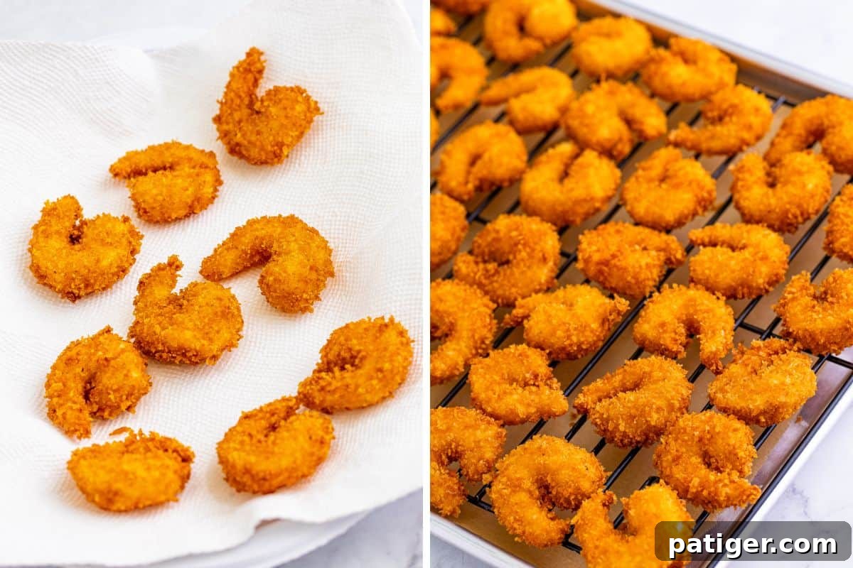 A two-image collage showing freshly fried panko shrimp draining on paper towels, and then transferred to a wire rack over a sheet pan to maintain crispiness.