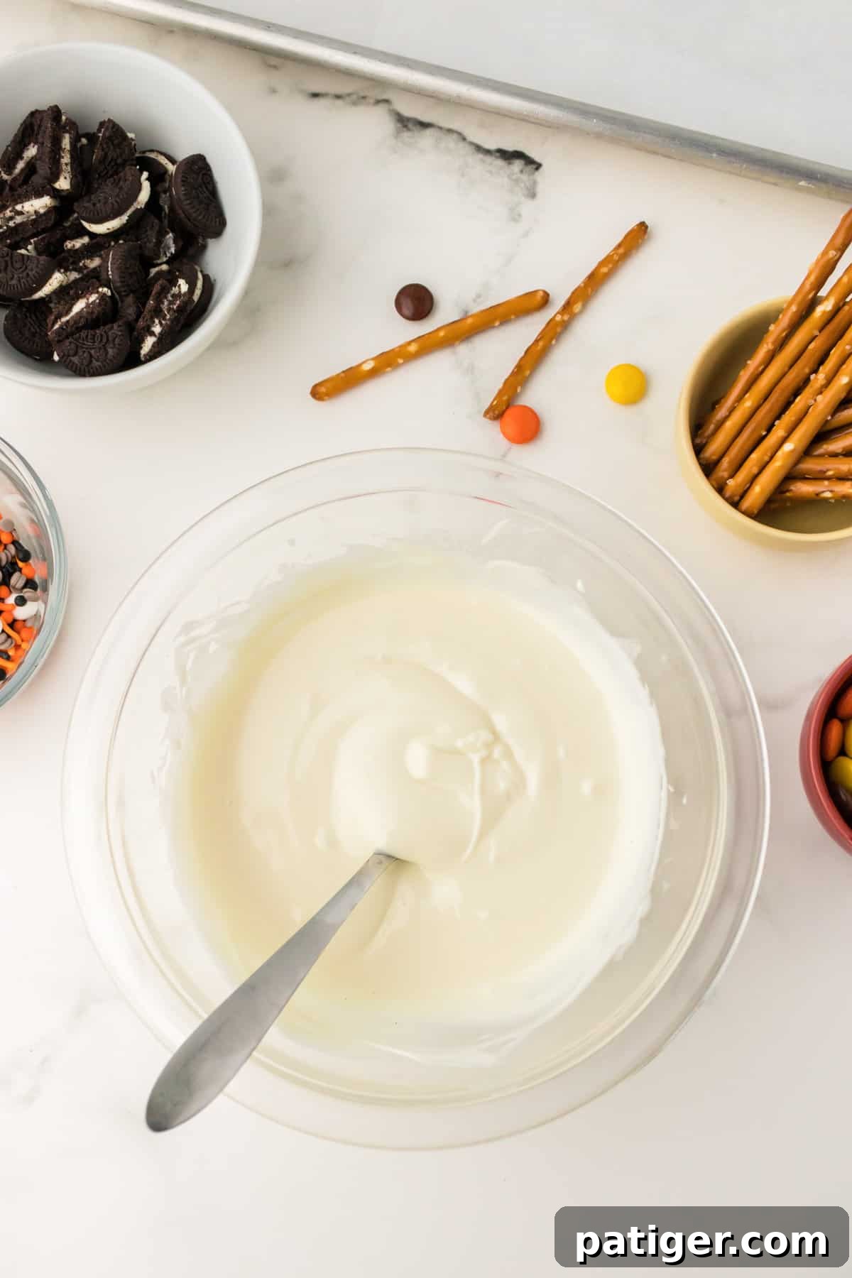 Glass bowl with smooth and creamy melted white chocolate.