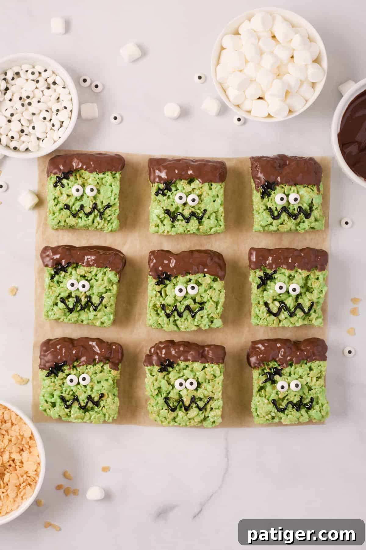Spooktacular Frankenstein Krispies 12 Frankenstein treats with black icing added to make mouth and scar on head.