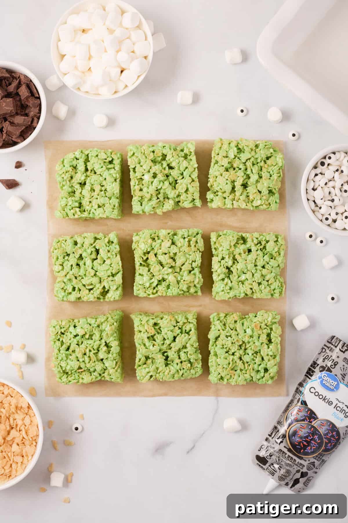Spooktacular Frankenstein Krispies 9 Green rice cereal treats cut into 9 equal squares.