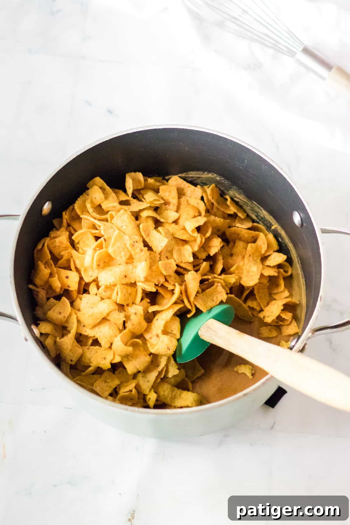 Fritos added to saucepan.