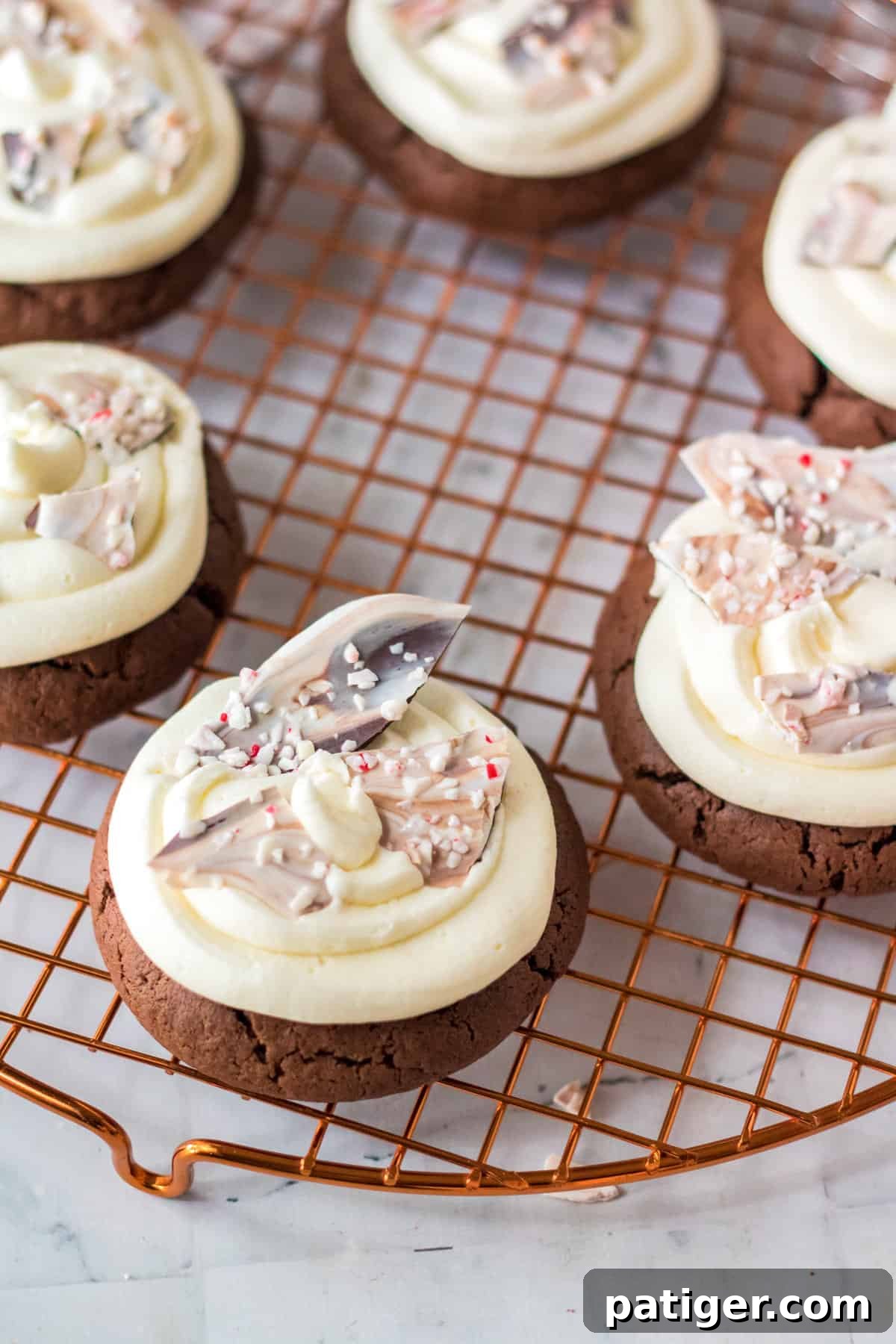 Chocolate peppermint bark cookies on wire rack.