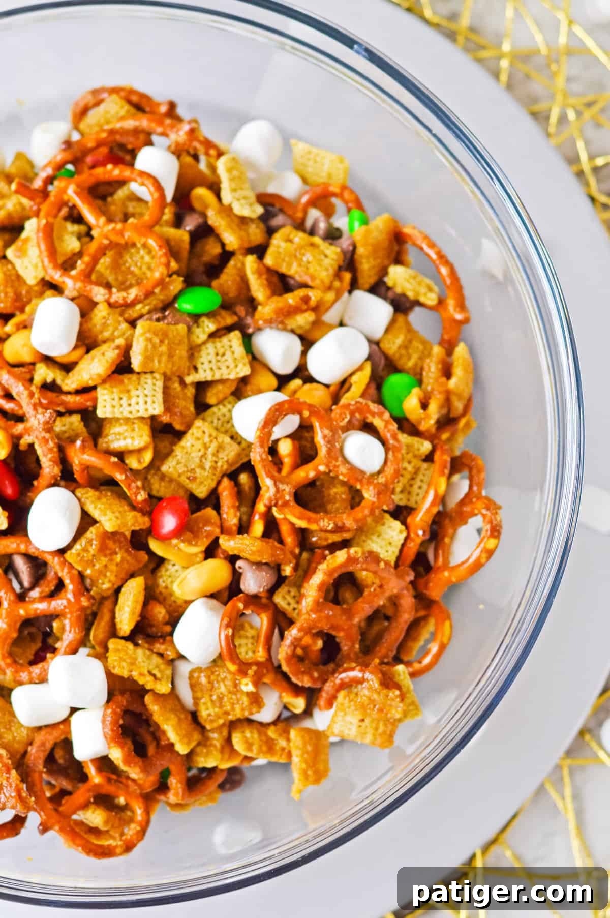 Holiday Hearth Mix 3 Overhead photo of holiday chex mix in glass bowl.