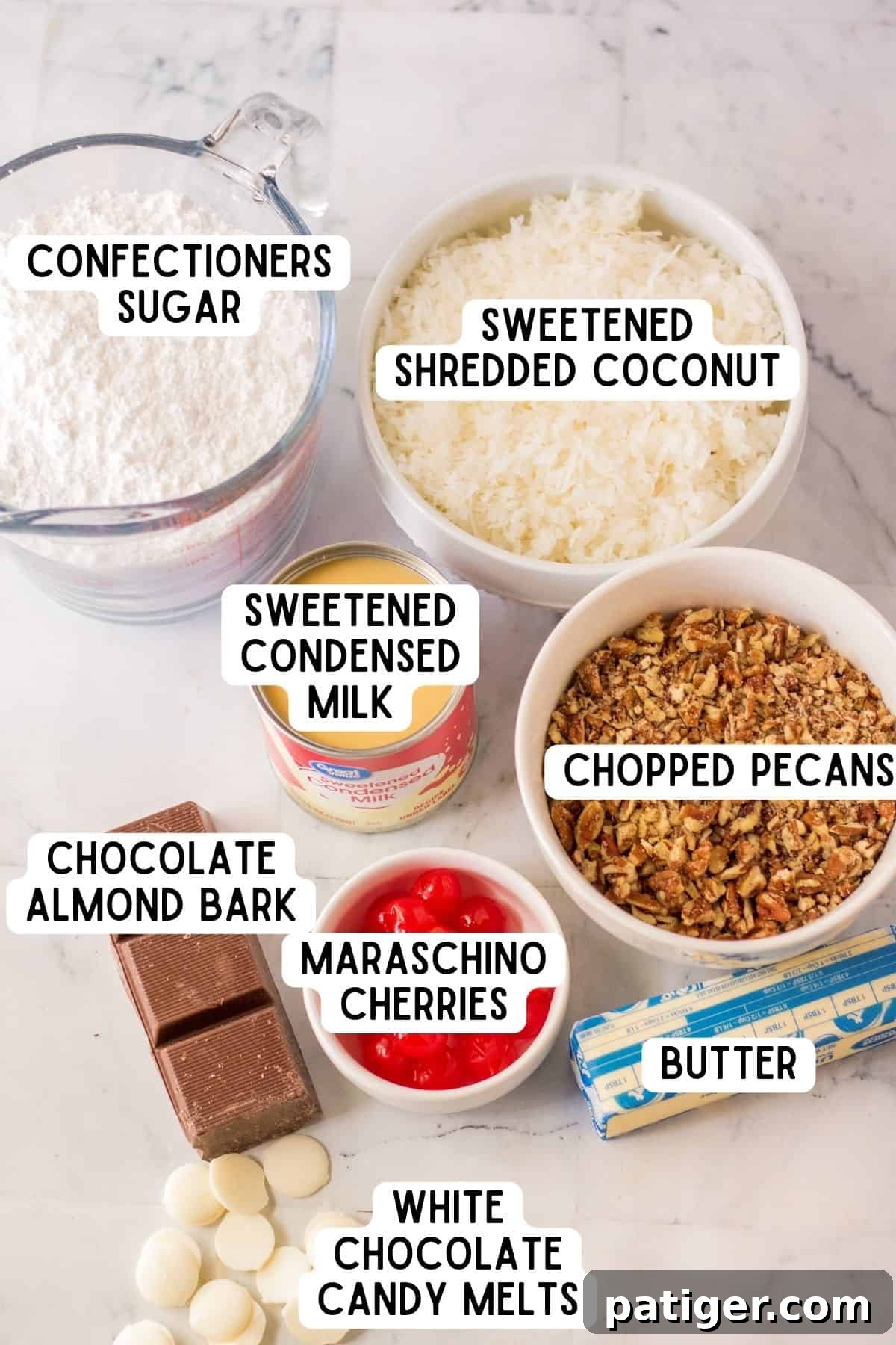A flat lay of all the essential ingredients for Martha Washington Candy, including butter, powdered sugar, sweetened condensed milk, vanilla extract, shredded coconut, pecans, maraschino cherries, and chocolate almond bark.