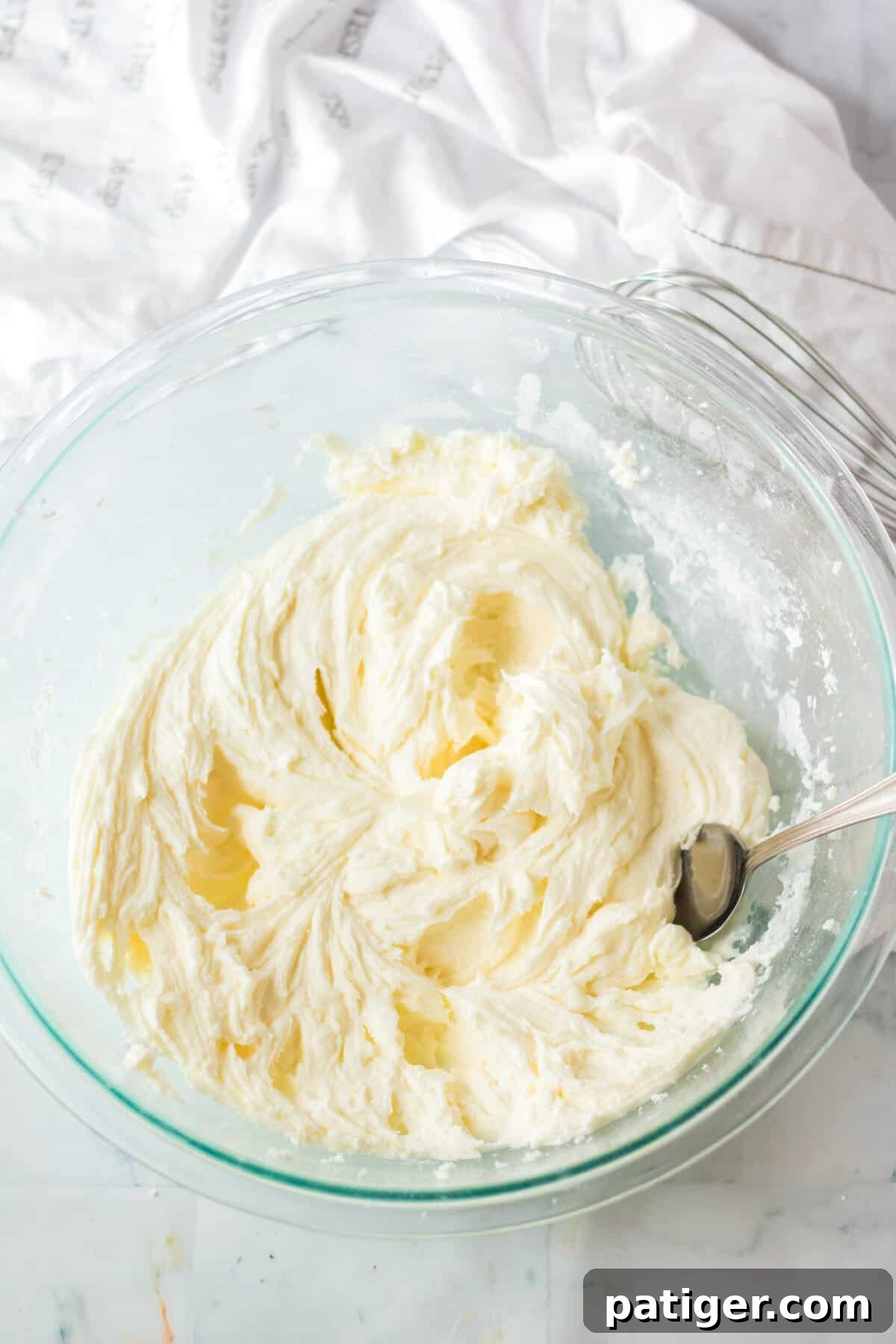 Bowl of vanilla buttercream frosting.