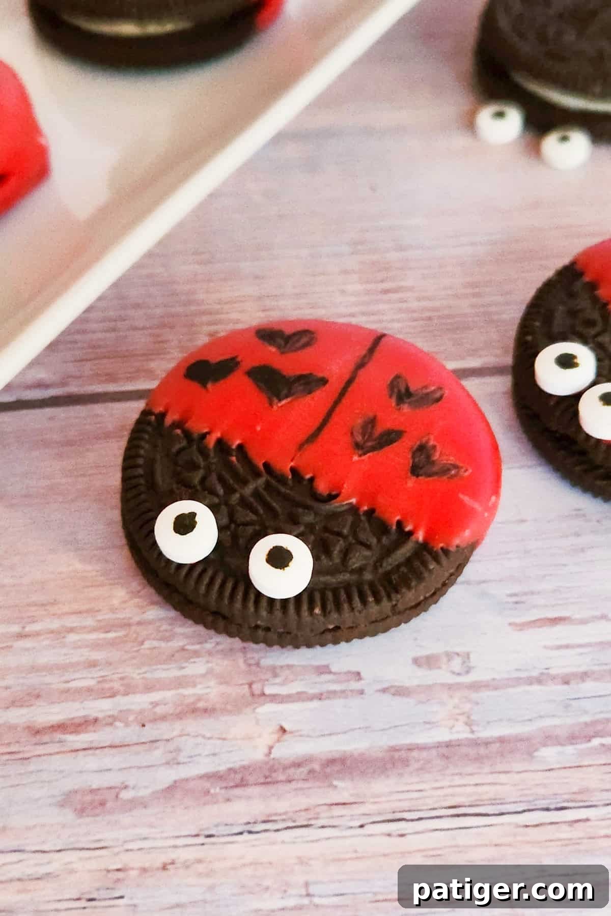 Valentine's Day Oreo Ladybugs with hearts instead of spots.
