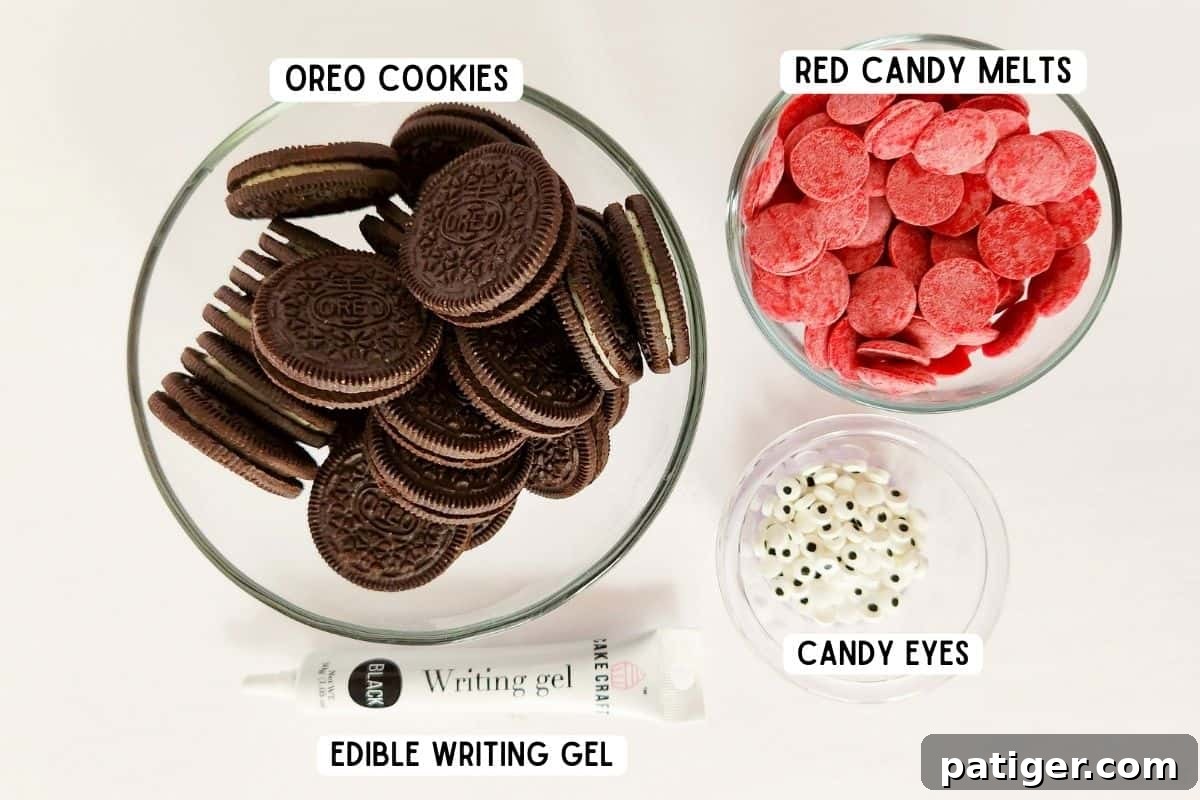 Ingredients for oreo love bugs: oreo cookies, red candy melts, candy eyeballs, and edible black writing gel.