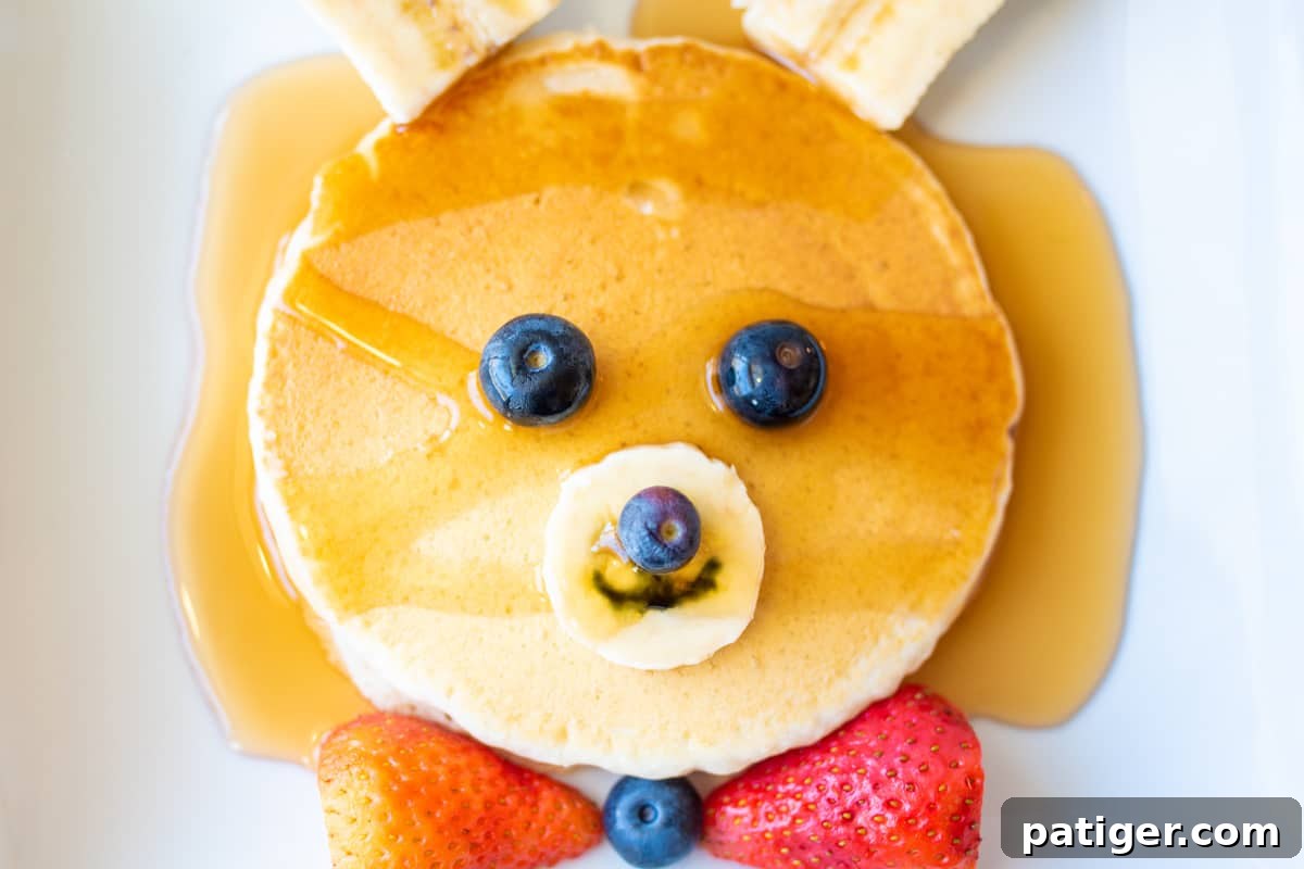 Bunny pancakes with pancake syrup, ready to be enjoyed.