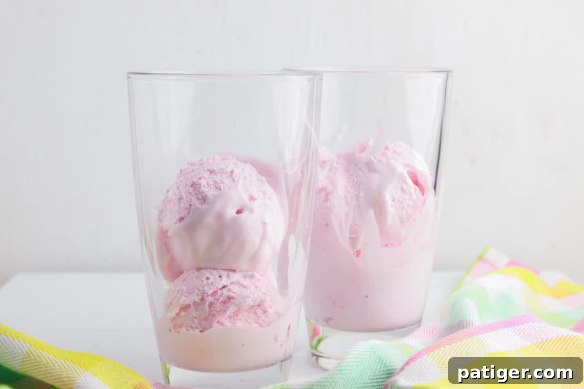 Vibrant Easter Elixir 5 Two drinking glasses each holding two scoops of softened strawberry ice cream, ready for the liquid ingredients.