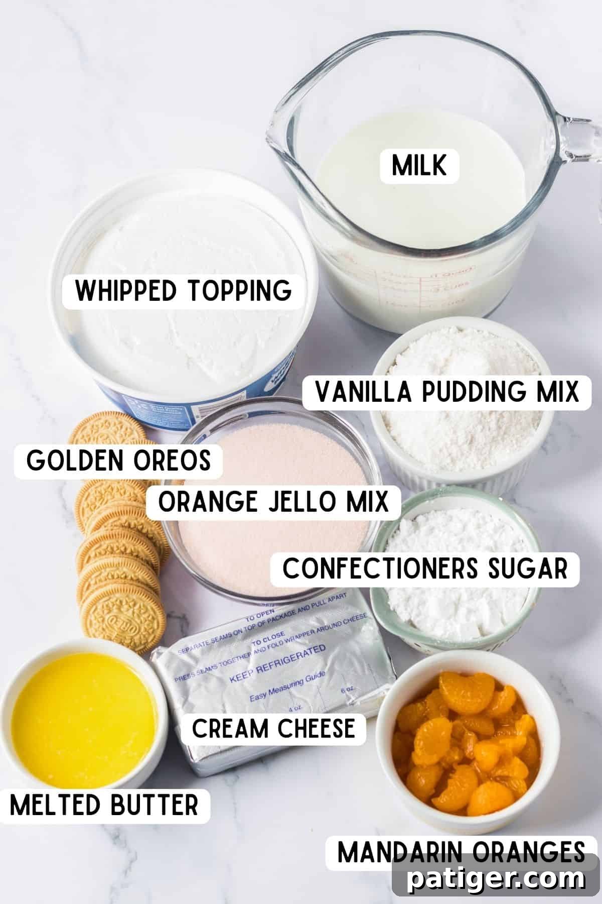 Whipped topping, milk, vanilla pudding mix, orange jello mix, confectioners sugar, golden oreos, cream cheese, mandarin orange pieces, melted butter, whipped topping, cream cheese.
