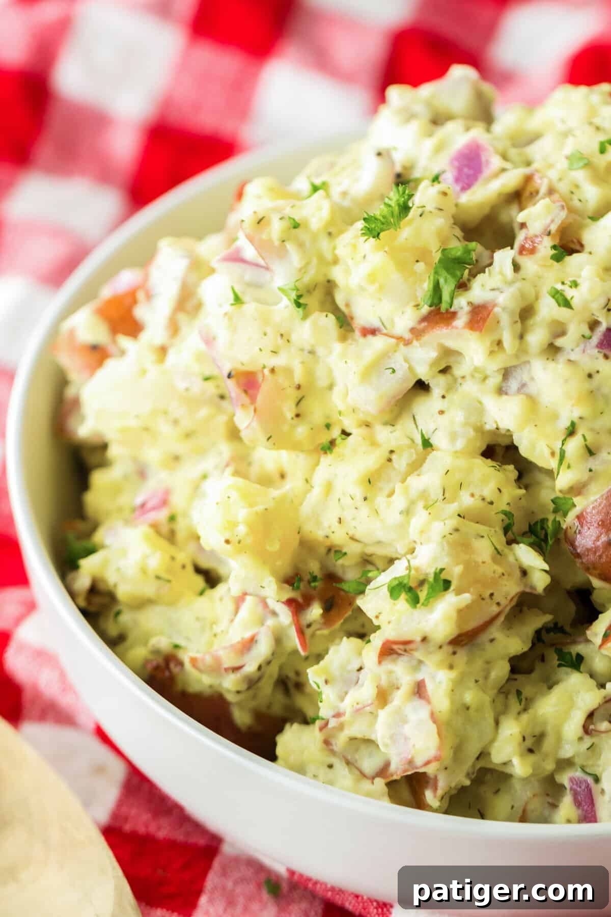 Creamy red skin potato served in a white bowl.