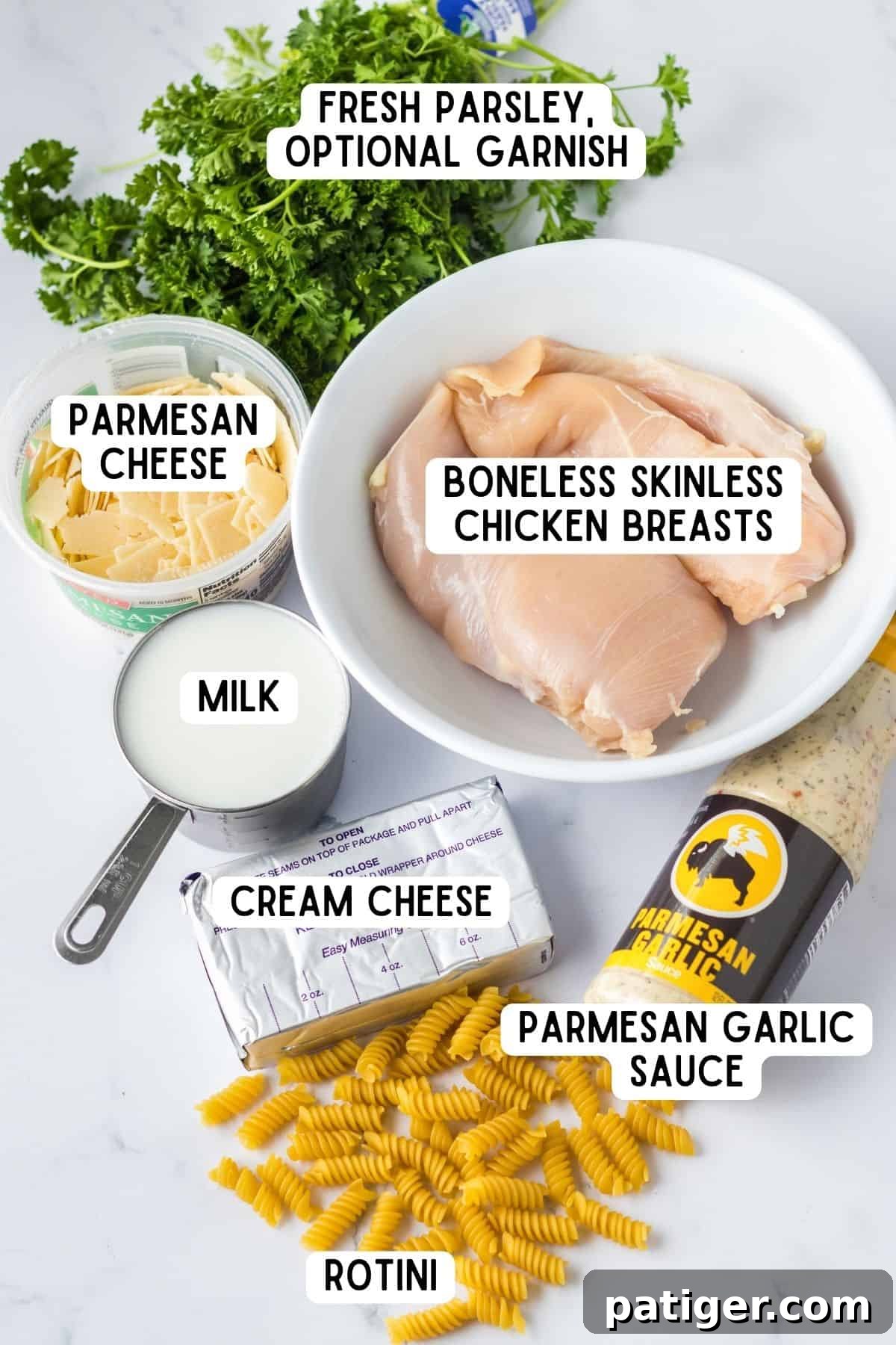 Creamy Crockpot Garlic Parmesan Chicken Pasta 4 Chicken breasts, Buffalo Wild Wings Garlic Parmesan Sauce, rotini pasta milk, cream cheese, parmesan cheese, and fresh parsley.