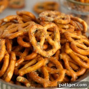 Garlic ranch pretzels in a silver bowl.