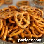 Garlic ranch pretzels in a silver bowl.