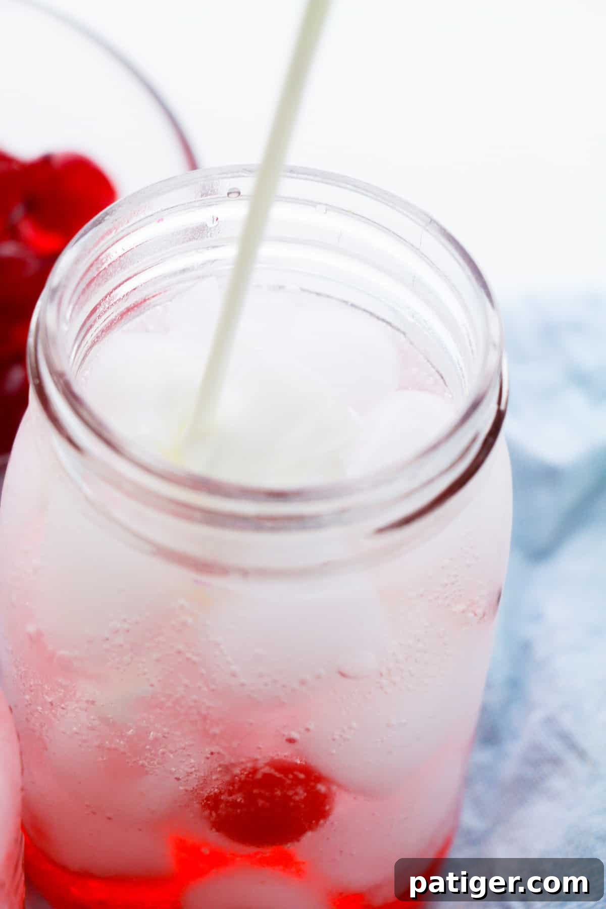 Shirley Temple Cream Soda 5 Creamer being poured into mason jar.