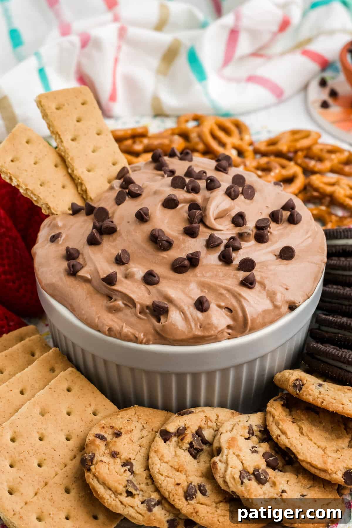 Edible Brownie Batter Dream 2 Brownie batter dip with graham crackers, pretzels, and cookies for dipping.