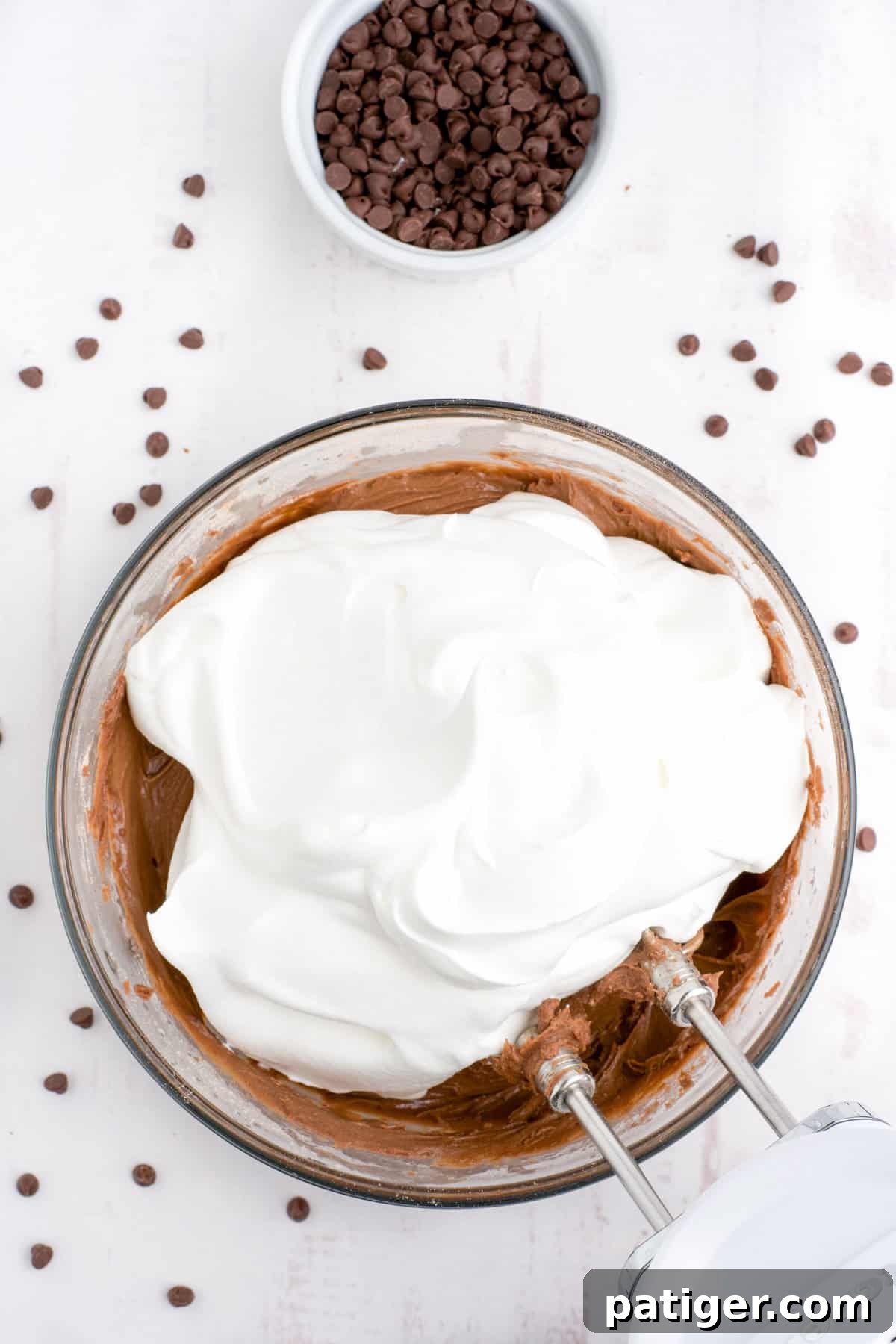 Edible Brownie Batter Dream 7 Whipped topping added to mixing bowl.