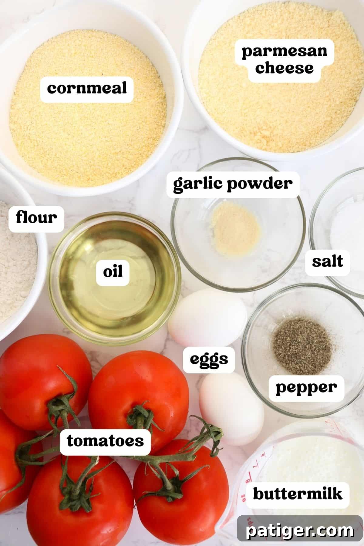 Cornmeal, flour, garlic powder, salt, pepper oil, 2 eggs, 5 tomatoes, buttermilk, and Parmesan cheese.