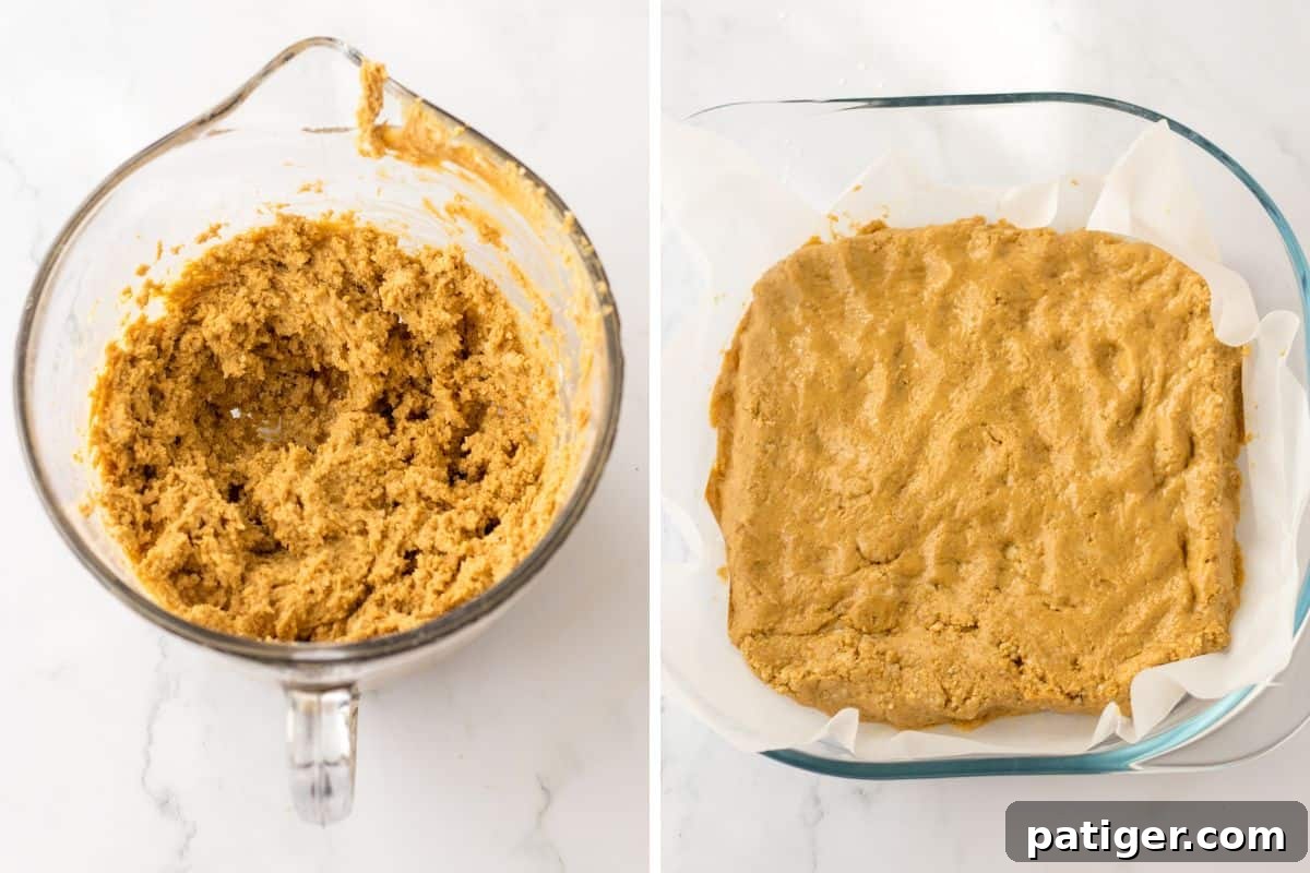 Chilled Chocolate Peanut Butter Fudge Squares 5 The peanut butter mixture shown with a wet sand texture in a glass mixing bowl, followed by the same mixture pressed evenly into a square pan lined with parchment paper.
