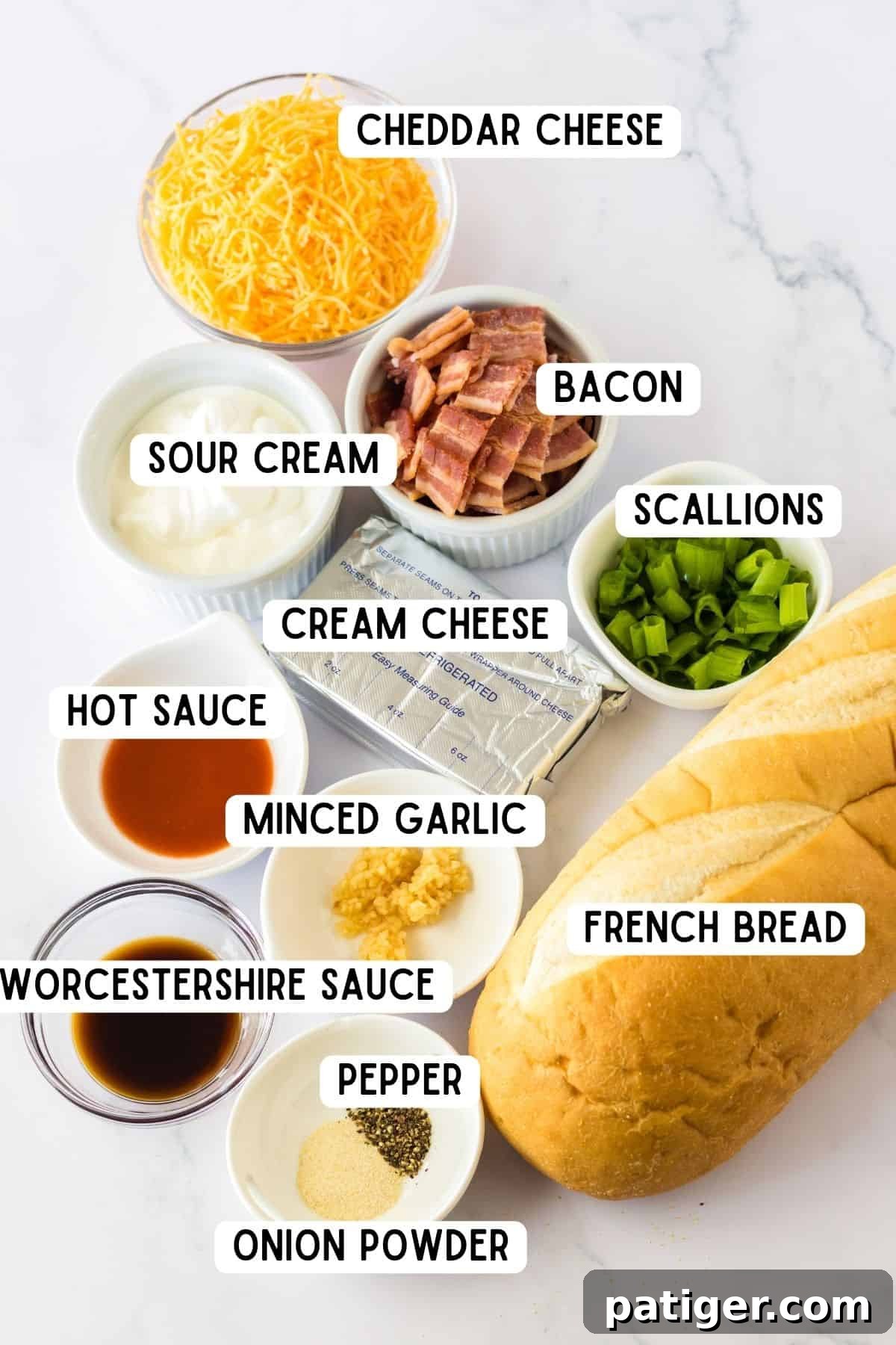 Shredded cheddar, chopped bacon, sour cream, chopped scallions, hot sauce, minced garlic, Worcestershine sauce, onion powder, pepper, and loaf of French bread.