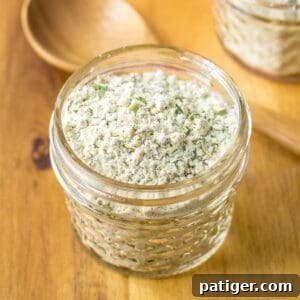 Delicious Homemade Ranch Seasoning 7 Homemade ranch seasoning mix with buttermilk powder in a small glass jar, ready for use.