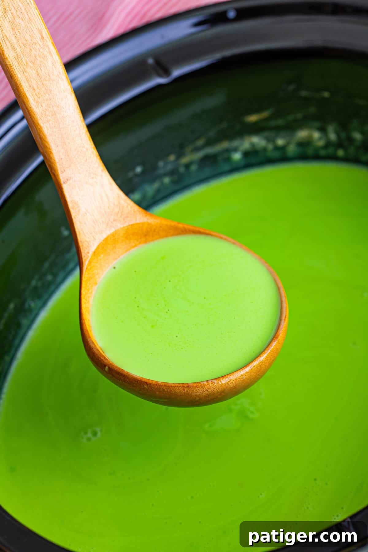 Thick and creamy green hot chocolate in a crockpot.