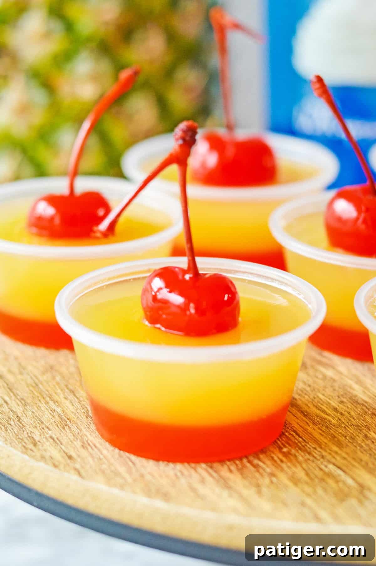 Caramel Pineapple Jell-O Shots 6 Cherry topped pineapple upside down jello shots.
