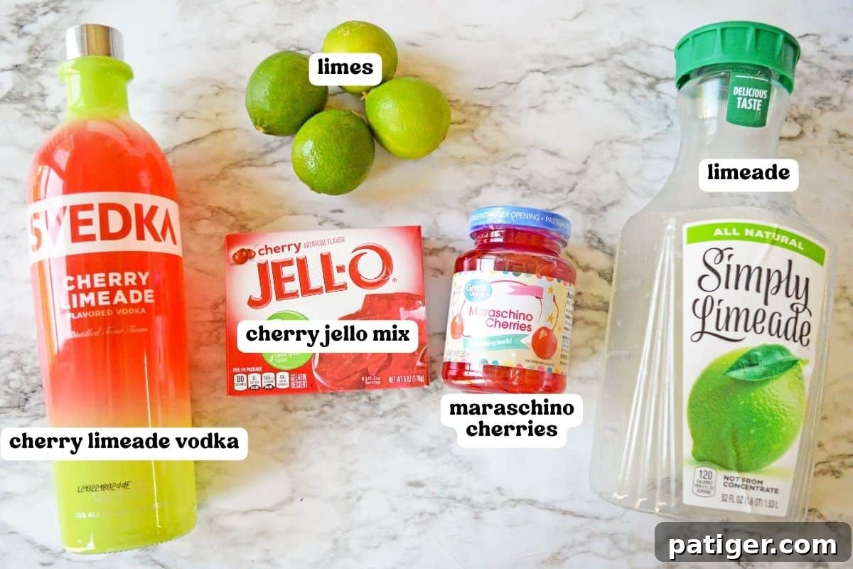 Svedka cherry limeade vodka, simply limeade, jar of maraschino cherries, box of cherry jello, and fresh limes.