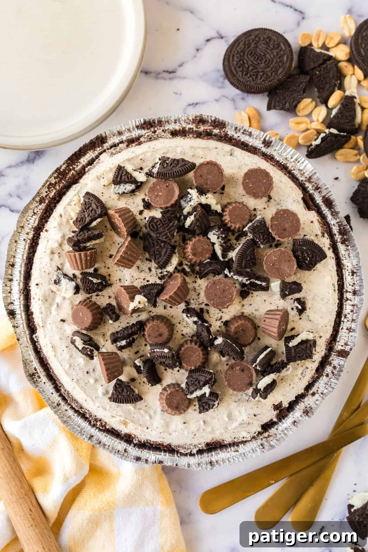 Decadent Oreo Peanut Butter Pie 2 Frozen no bake Oreo chocolate peanut butter pie with a store-bought Oreo crust, ready to be served.