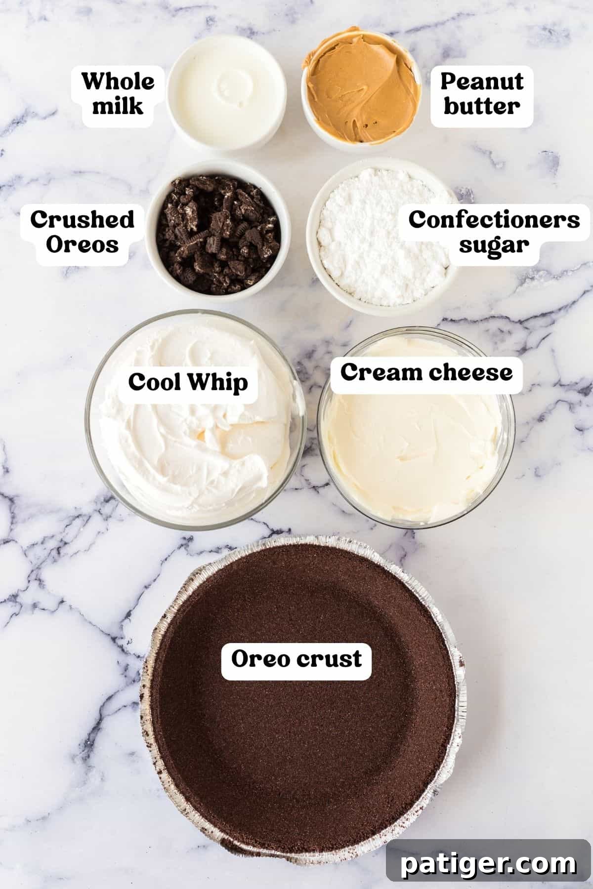 Decadent Oreo Peanut Butter Pie 4 All ingredients for Oreo and peanut butter pie laid out on a countertop: whole milk, creamy peanut butter, crushed Oreo cookies, confectioners sugar, Cool Whip, cream cheese, and a store-bought Oreo pie crust.