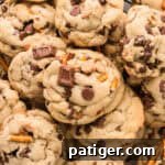 Thick Kitchen Sink Cookies with chocolate chips, peanut butter chips, pretzels, toffee bits, caramel bits, and chocolate chunks.