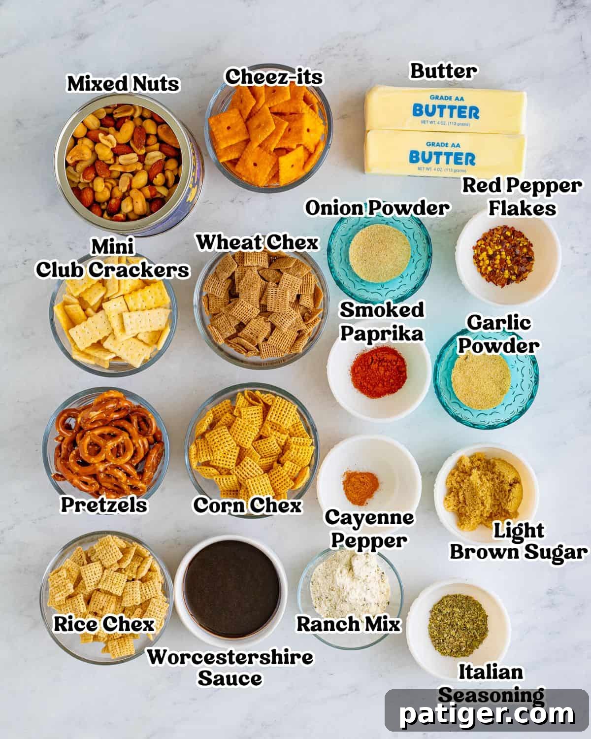 Blazin' Snack Fusion 3 Labeled ingredients for chex mix recipe: mixed nuts cheeze-its, wheat chex, corn chex, rice chex, mini crackers, pretzels twists, two sticks of butter, ranch mix, light brown sugar and seasonings.