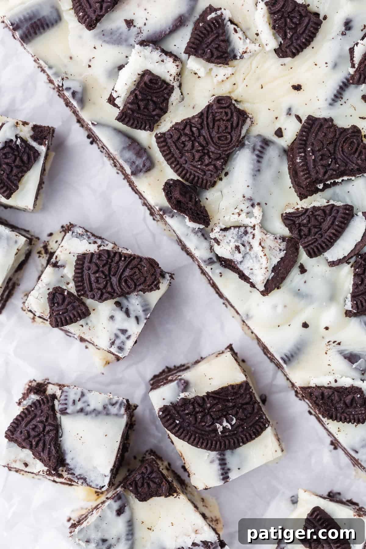 Super Simple 3-Ingredient Oreo Fudge 9 Overhead photo of 3 ingredient oreo fudge being sliced.