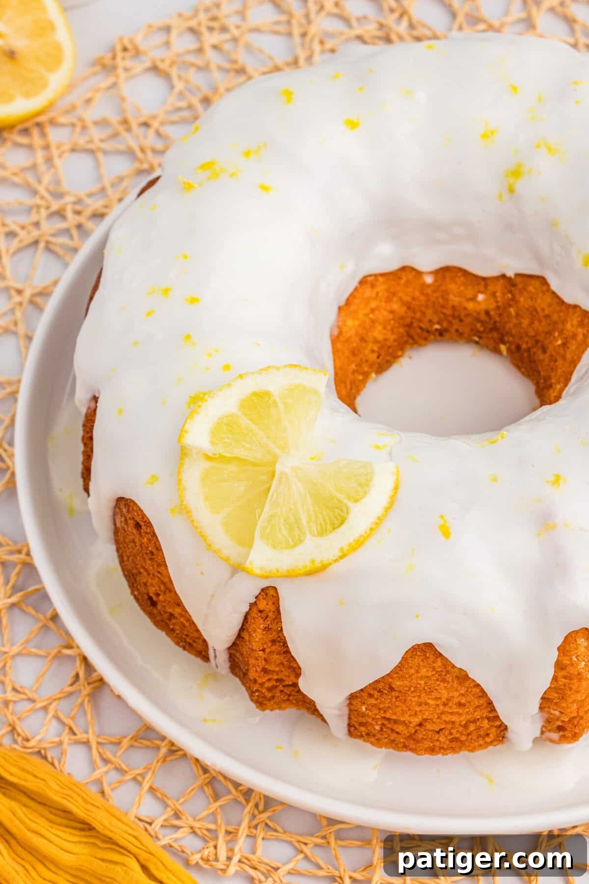 Moist Lemon Bundt Cake with Lemon Glaze Drizzled over the top.