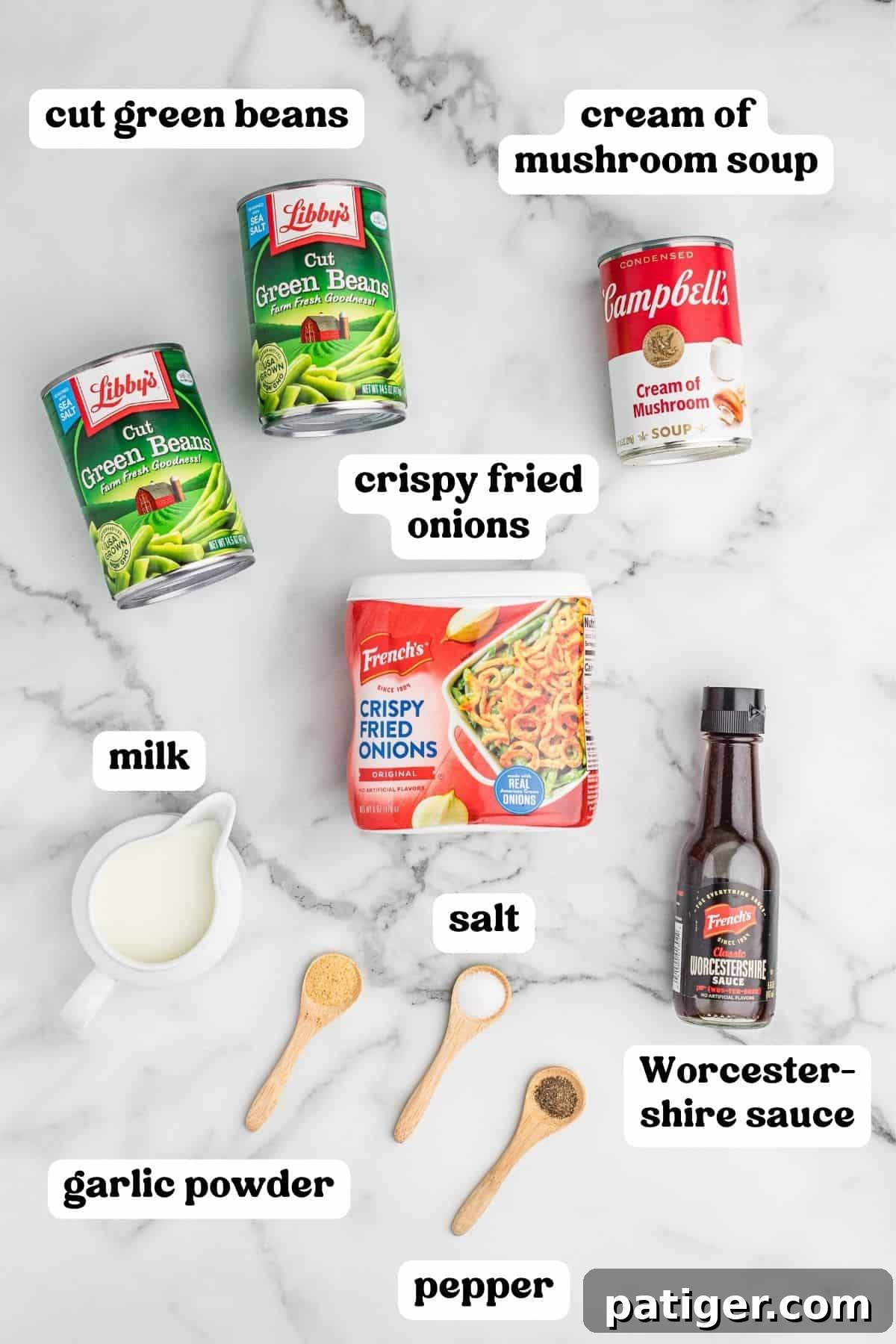 Creamy Green Bean Crunch 4 All the ingredients for green bean casserole, including 2 cans of cut green beans, cream of mushroom soup, milk, Worcestershire sauce, garlic powder, salt, pepper, and crispy fried onions.