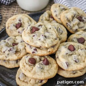 A black plate filled with Greek yogurt chocolate chip cookies, highlighting their rich chocolate chips and golden-brown edges.