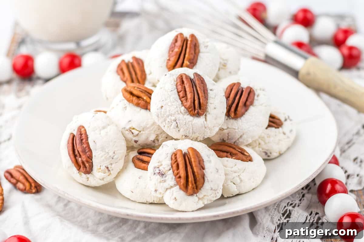 Plate filled with classic divinity candy cookies topped with pecans, perfect for holiday desserts or edible gifting.